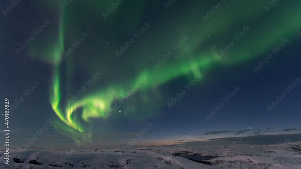 Beautiful aurora borealis in the tundra in winter. Beautiful aurora borealis in the tundra in winter.