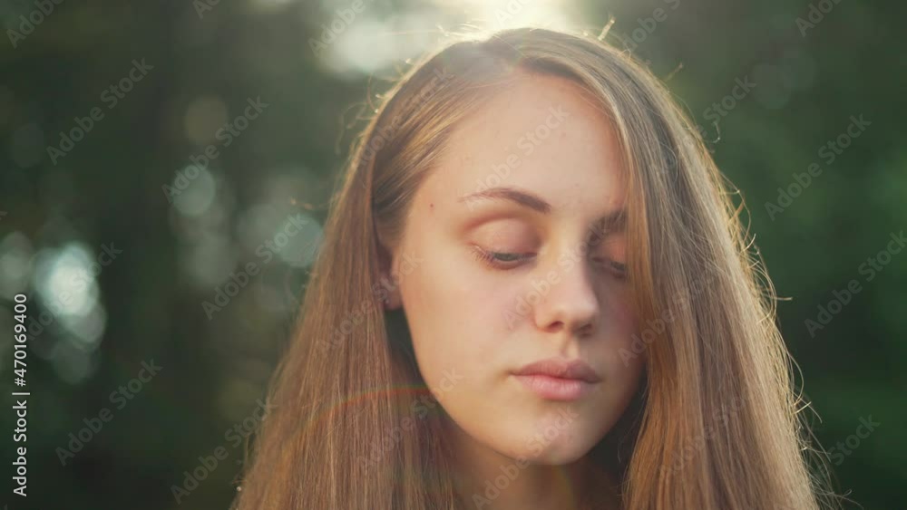 Happy girl in rays of the sun. Girl face in park close-up. Dream girl. Happy face of a child in rays of sun. Child smiles at camera. Girl dream. Face close-up. Happy child in park.Beautiful face Happy girl in rays of the sun. Girl face in park close-up. Dream girl. Happy face of a child in rays of sun. Child smiles at camera. Girl dream. Face close-up. Happy child in park.Beautiful face