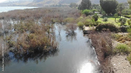 The west coast Sea of Galilee, also called Lake Tiberias, Kinneret or Kinnereth, is a freshwater lake in Israel
