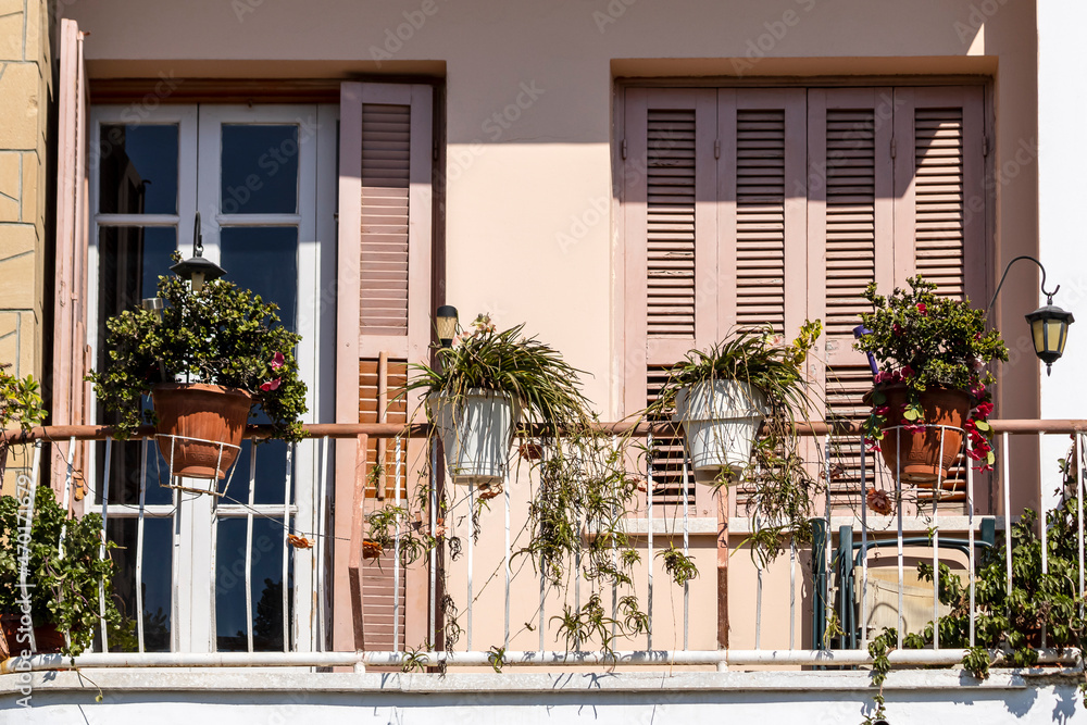 Mediterranean style balcony with flowers Mediterranean style balcony with flowers