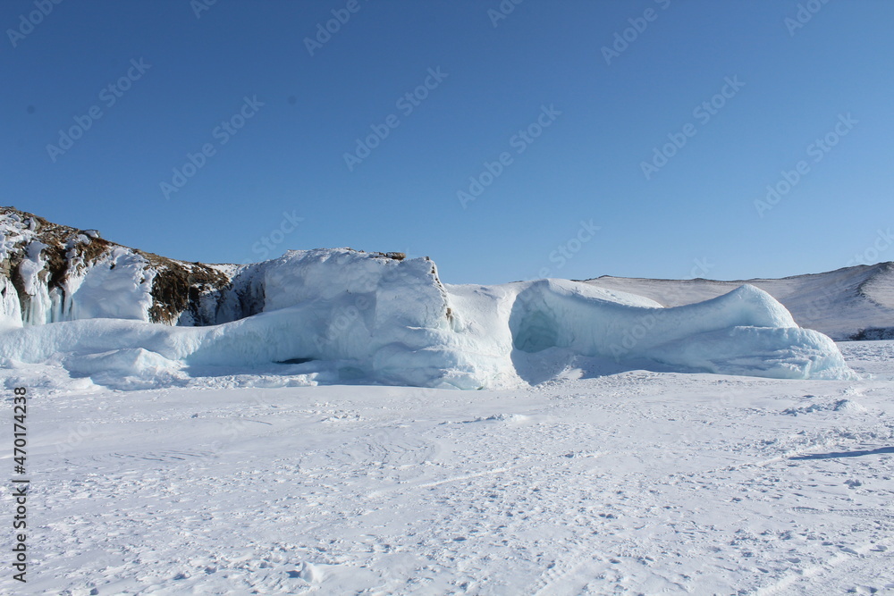 Baikal lake in winter, ice formations, cliff, snow landscape
