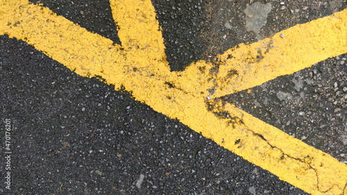 No parking area sign on asphaltic surface. Yellow crossing sign on the textured floor. © Porsche