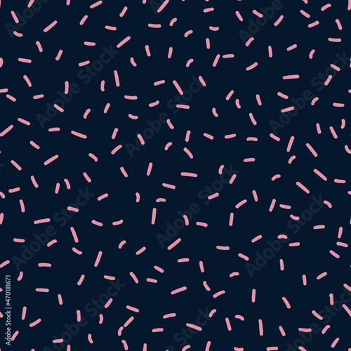 Random placed vector strokes seamless repeat pattern. Short lines all over minimal print on dark blue background.
