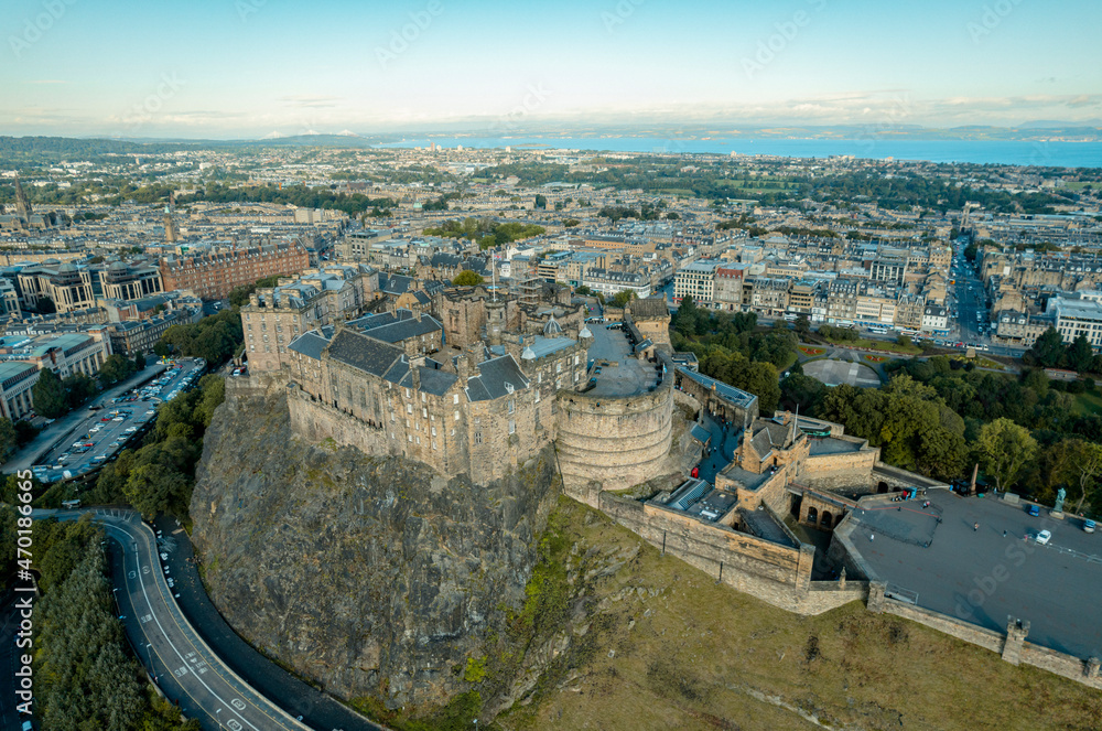 Top aerial view of Edinburgh city overlooking the Old Town. Edinburgh Castle has been Edinburgh's dominant landmark. Edinburgh Castle is one of the most important and historic castles in Scotland