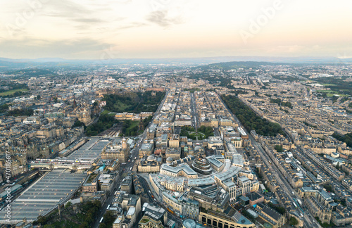 Aerial view of Edinburgh in the morning sunrise. Sunlight, a breathtaking view of the Georgian architecture of Edinburgh fills the screen in this aerial shot. Travel and explore the Scottish capital