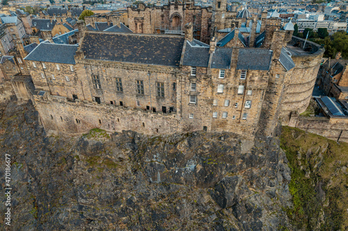 Stunning aerial view of Edinburgh in Scotland, with the royal castle occupying commanding position on volcanic crag with cliffs on three sides and the fourth side facing the capital city Edinburgh photo