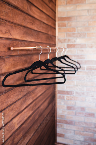 clothes hanger on a wood wall