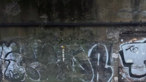 beautiful colorful graffiti pieces view from moving B train subway in Brooklyn New York City