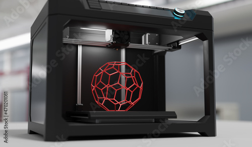 Foto 3D printer is printing polyhedron shape from plastic