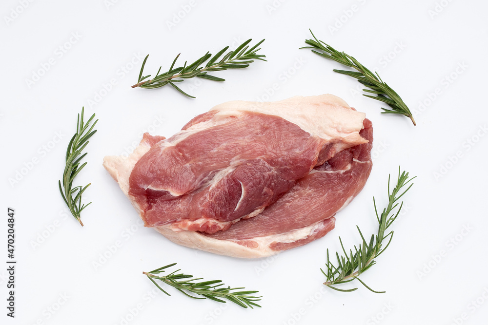 Pork meat with rosemeary on white background. Pork meat with rosemeary on white background.