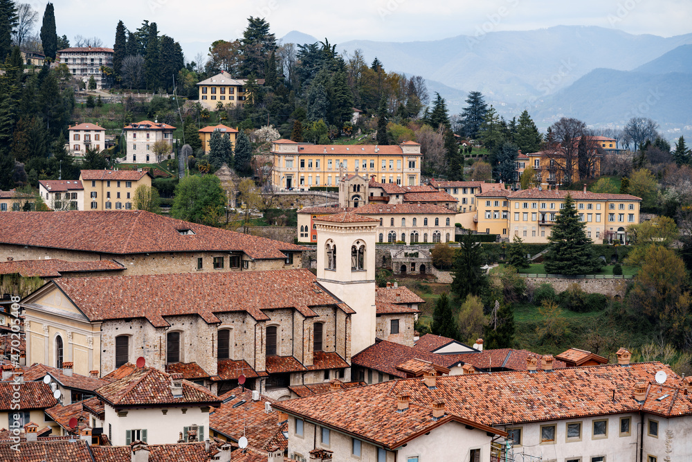 Red tiled roofs of old houses. Bergamo, Italy