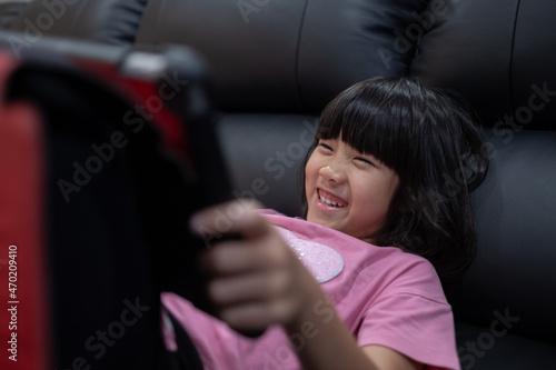 kid watching tablet, child addicted cartoon © waranyu