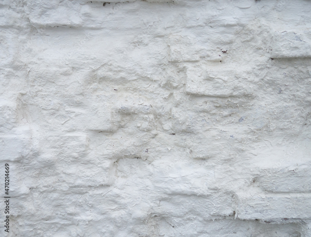 Obraz premium Old, uneven masonry. whitewashed brick, brickwork