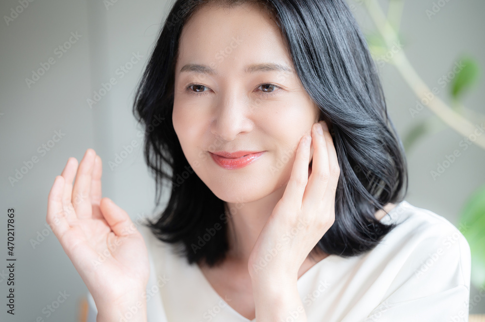 Beautiful Asian (Japanese) woman who cares about her skin Close-up Copy space Beautiful Asian (Japanese) woman who cares about her skin Close-up Copy space