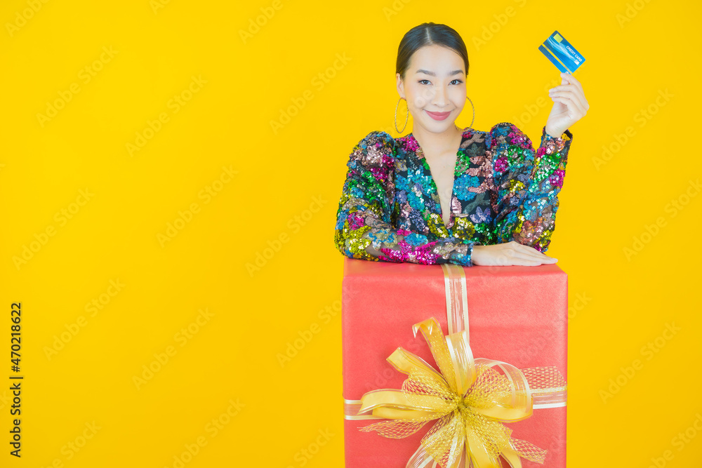 Portrait beautiful young asian woman smile with red gift box Portrait beautiful young asian woman smile with red gift box