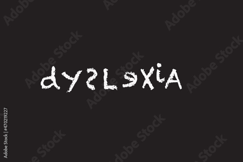 dyslexia spelled in white chalk letters on a blackboard