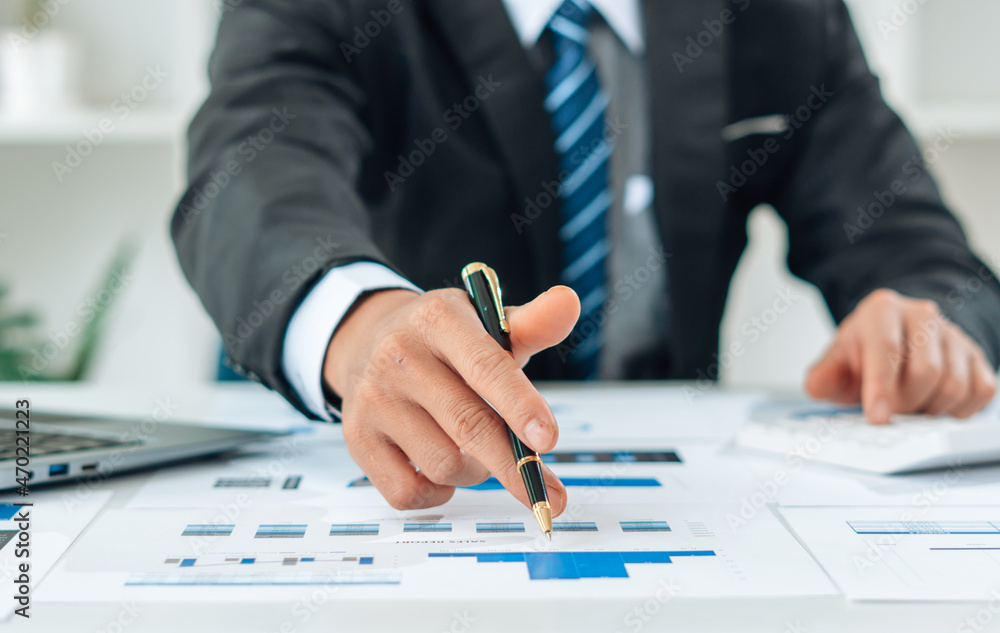 Close up view of bookkeeper or financial inspector hands making report, calculating or checking balance. Home finances, investment, economy, saving money or insurance concept. Close up view of bookkeeper or financial inspector hands making report, calculating or checking balance. Home finances, investment, economy, saving money or insurance concept.
