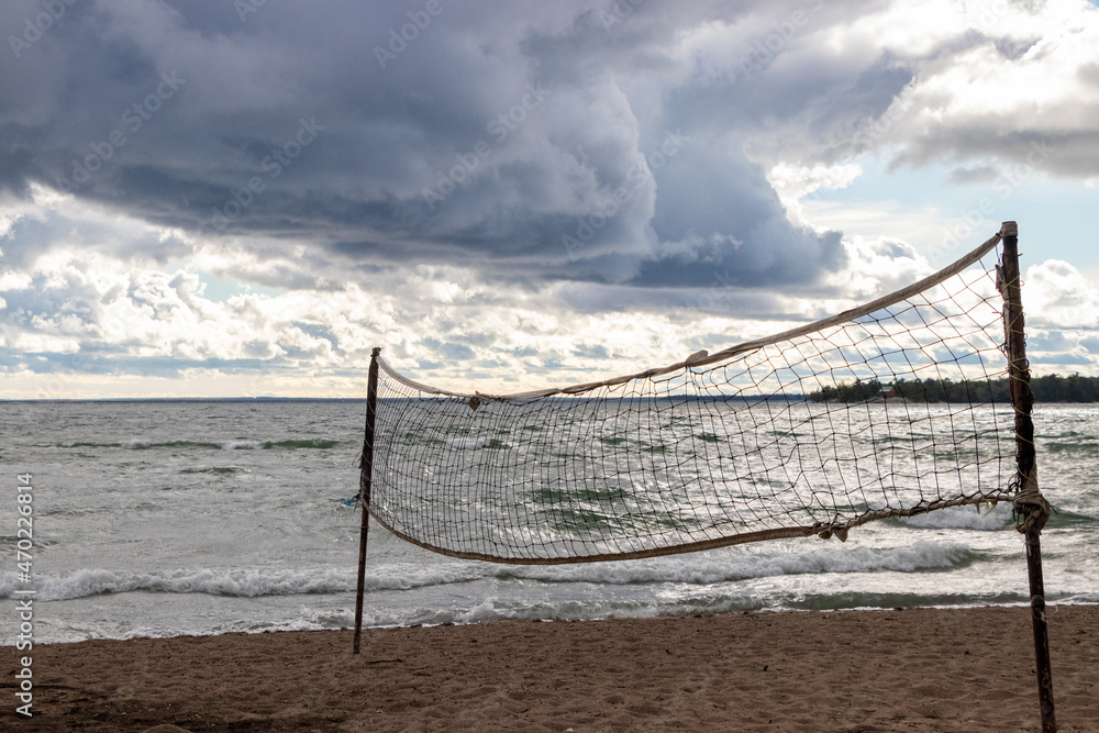 Volley ball net on the beach on Lake Superior in Ontario, Canada Volley ball net on the beach on Lake Superior in Ontario, Canada