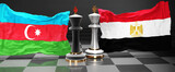 Azerbaijan Egypt summit, meeting or aliance between those two countries that aims at solving political issues, symbolized by a chess game with national flags, 3d illustration