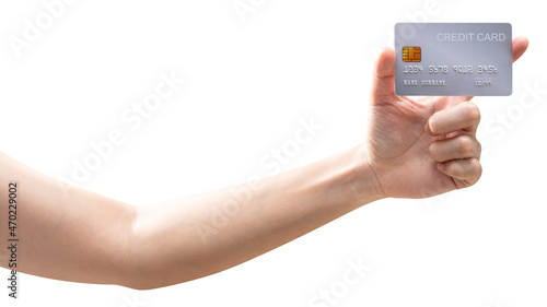 Woman's hand holds a silver platinum credit card isolated on white background. 