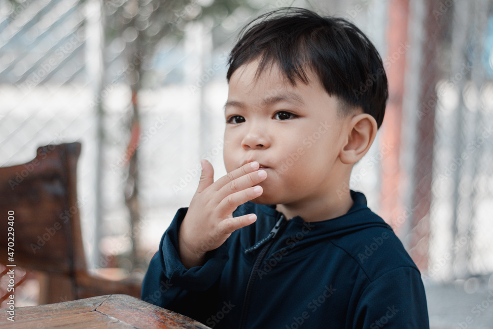 boy eating bread