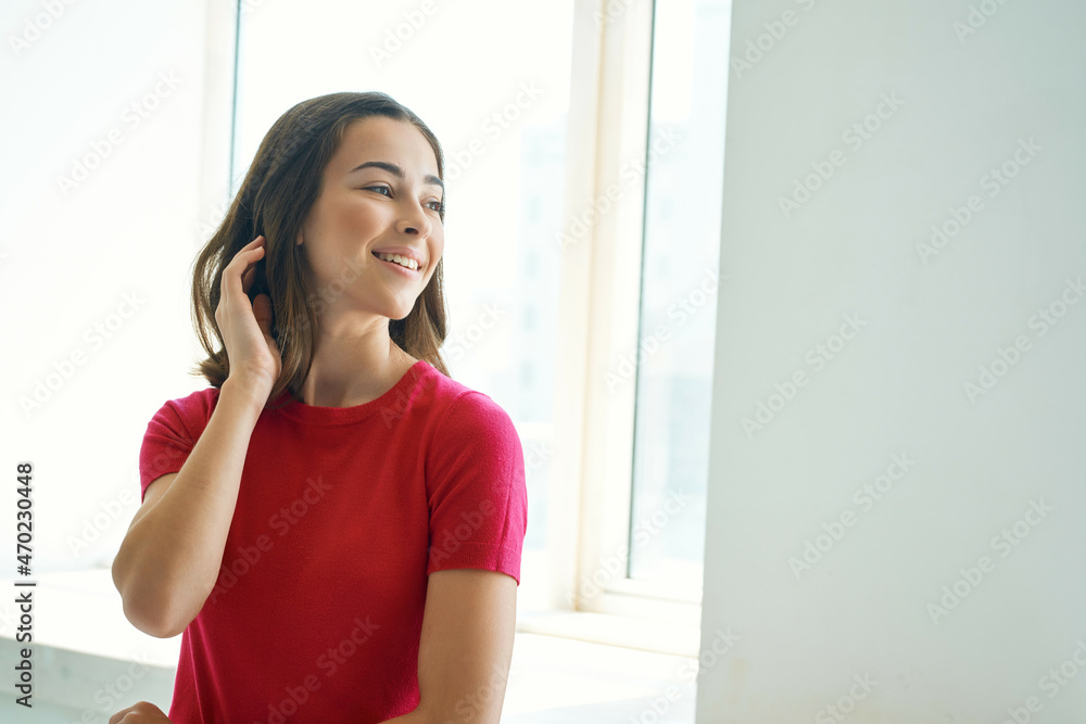 beautiful woman holding on to hair cosmetics Studio Lifestyle beautiful woman holding on to hair cosmetics Studio Lifestyle