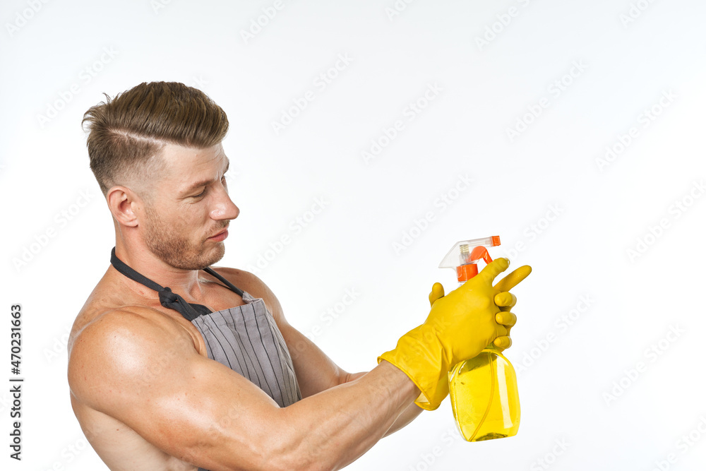emotional man in apron with detergent cleaning housework emotional man in apron with detergent cleaning housework