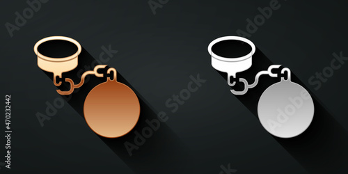 Gold and silver Ball on chain icon isolated on black background. Long shadow style. Vector