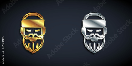 Gold and silver Bearded lumberjack man icon isolated on black background. Long shadow style. Vector