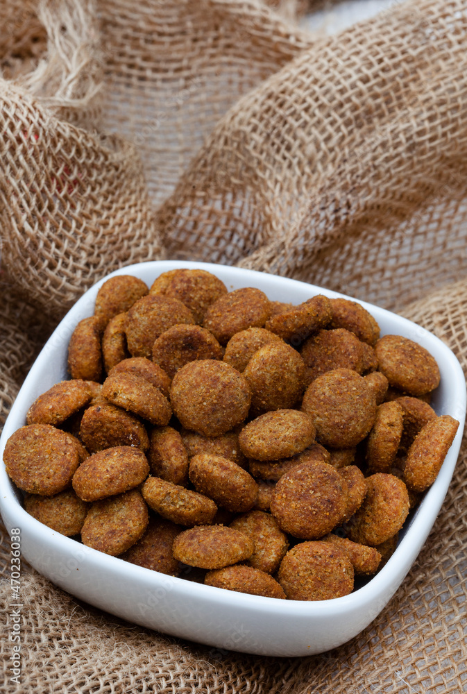 Selection of dogfood options, raw pets mince, chunks in gravy and dry kibbles Selection of dogfood options, raw pets mince, chunks in gravy and dry kibbles