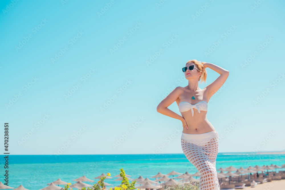 European Woman Tourist, vacation time, Tropical and Africa views, concept of travels and adventures European Woman Tourist, vacation time, Tropical and Africa views, concept of travels and adventures