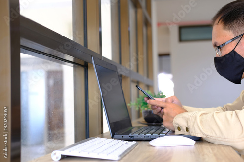 Businessman working on computer an office