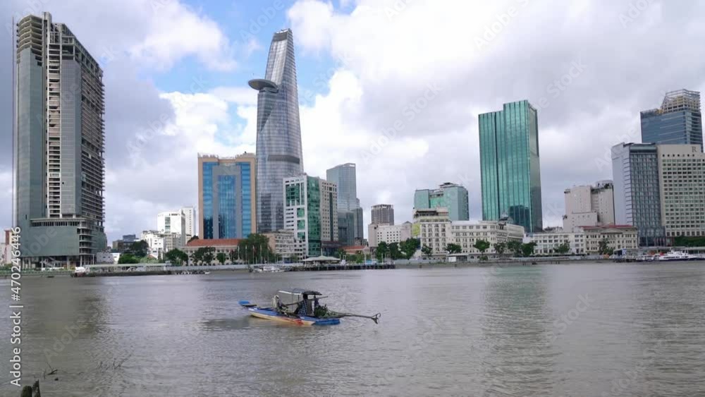 Skyscrapers along river with architecture office towers, hotels, center cultural and commercial development country most in Ho Chi Minh city, Vietnam Skyscrapers along river with architecture office towers, hotels, center cultural and commercial development country most in Ho Chi Minh city, Vietnam