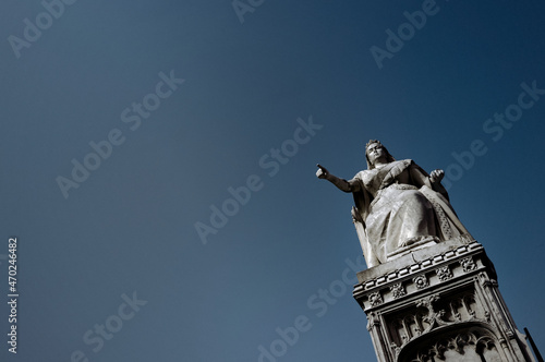 Queen Victoria Statue erected in 1898 to commemorate the Queen's jubilee. The figure of the Queen is enthroned and points towards the sea, Clifftown Parade, Southend-on-Sea, Essex, England photo