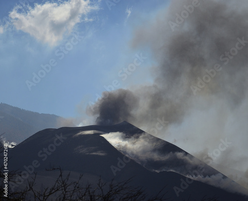 Active volcano with gas clouds and blue sky in the background, Island of La Palma, Spain