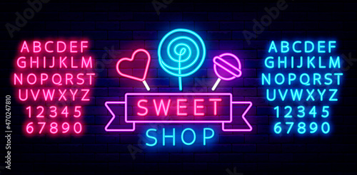Sweet shop neon sign with candy. Shiny alphabet. Retro logo with ribbon. Vector stock illustration