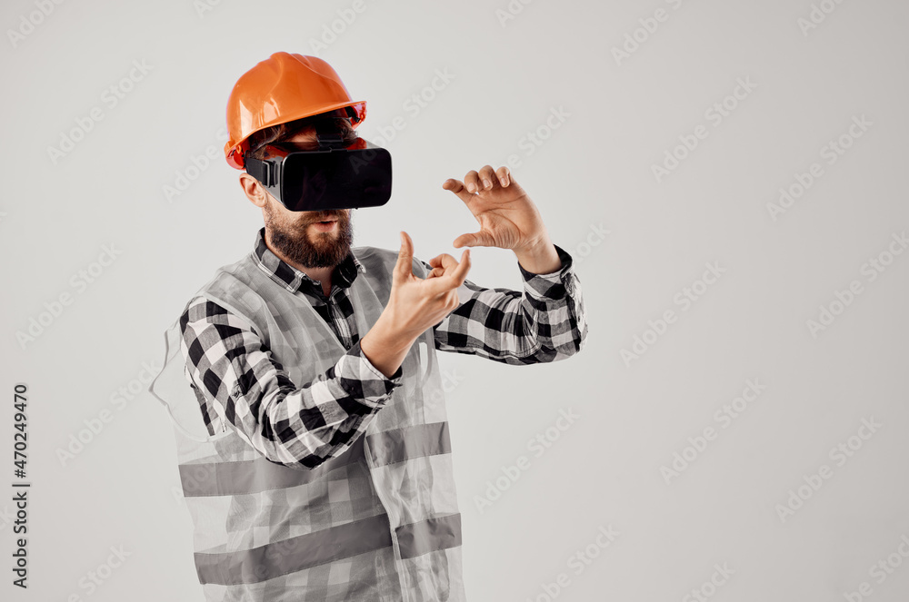 male builder in virtual reality glasses innovation light background male builder in virtual reality glasses innovation light background