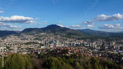 Aerial drone view of city of Sarajevo. Capital of Bosnia and Herzegovina. Mountains near Sarajevo in early spring.