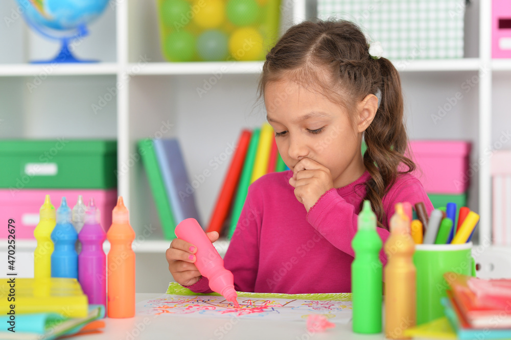 Porait of cute girl drawing picture at home Porait of cute girl drawing picture at home