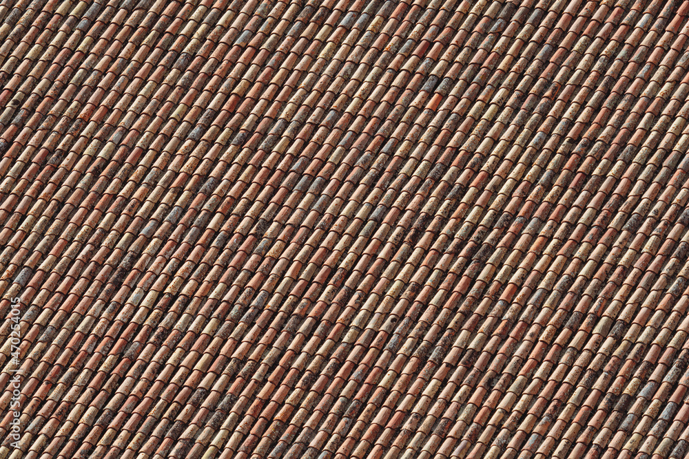 Tile roof background closeup view with sun and shadows Tile roof background closeup view with sun and shadows