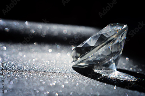diamond close up over bright sparkling background photo