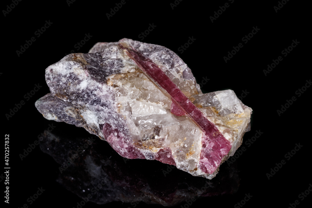 macro mineral tourmaline stone on black background macro mineral tourmaline stone on black background