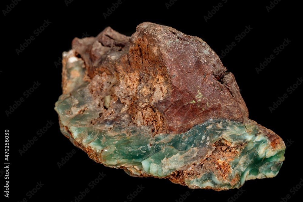 Fototapeta premium Macro of a stone Chrysoprase mineral on a black background