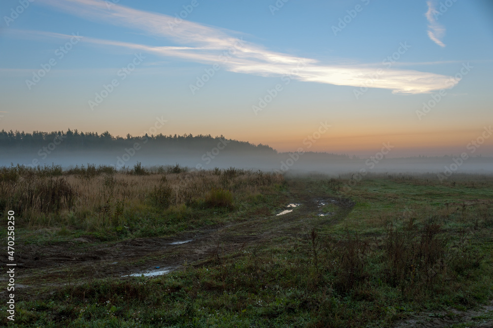 September morning landscape with fog