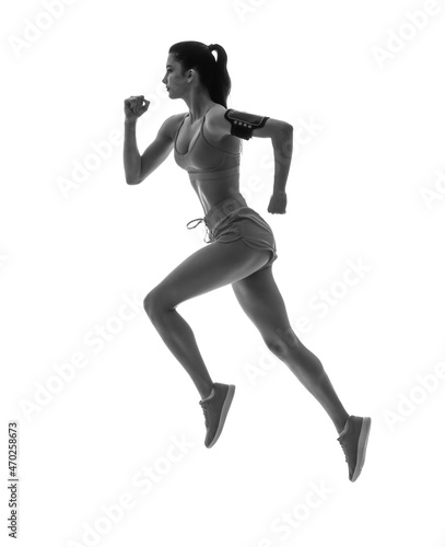 Silhouette of sporty running woman on white background © Pixel-Shot