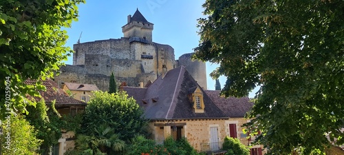 Chateau de Castelnaud next to the Dordogne river, Aquitaine, France photo