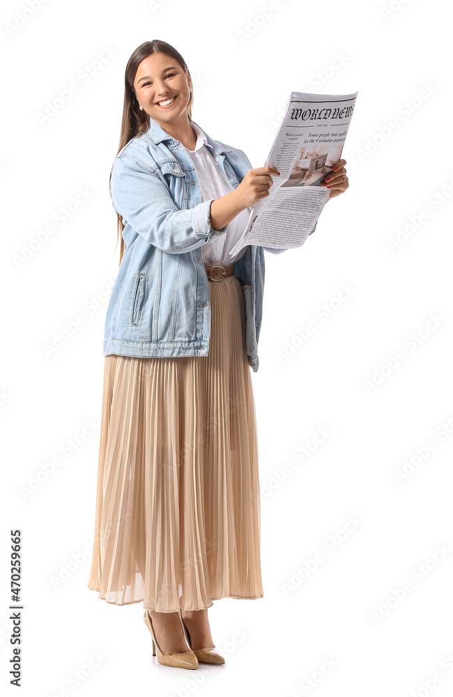 Young woman in denim jacket reading newspaper on white background Young woman in denim jacket reading newspaper on white background