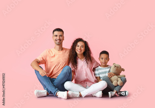 Happy interracial family on...