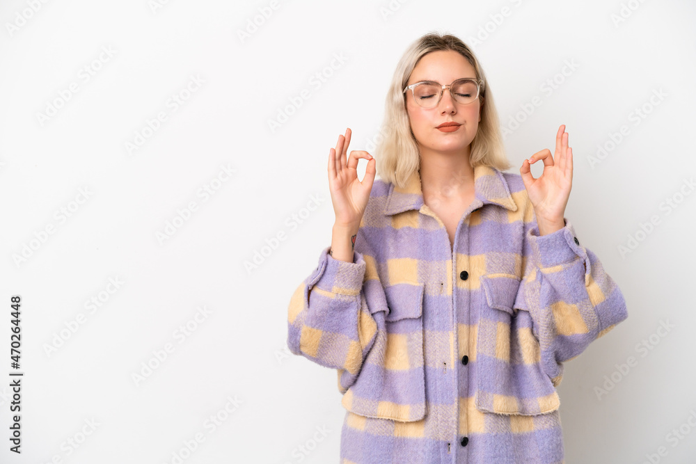 Young caucasian woman isolated on white background in zen pose Young caucasian woman isolated on white background in zen pose