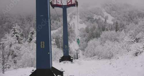 Beautiful frosty winter landscape of ski lift in snowy Carpathian mountains, Slavsko, Ukraine. photo